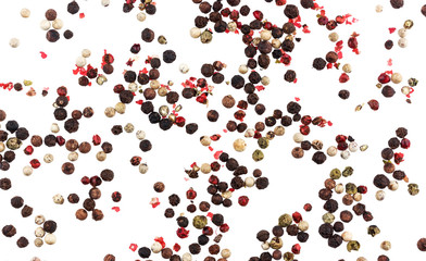 Different peppers isolated on white background (black, red, green and white peppercorns)