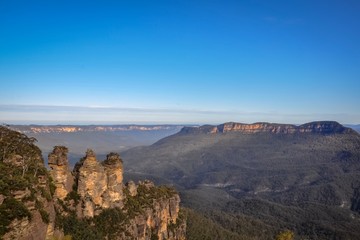 Obraz premium Three sister rock formation and an Eucalyptus valley, Australia