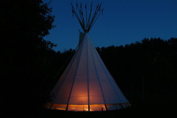 a tipi at twilight