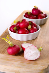 Bowl, on one containing some raw radishes