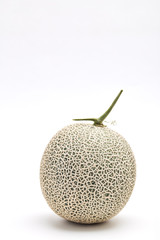 Single cantaloupe melon on white