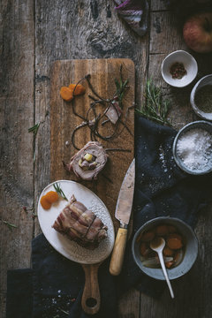 Knife and spices near pork enderlion