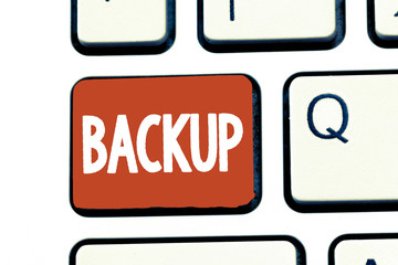 Writing note showing Backup. Business photo showcasing copy of file or other item data made in case original is lost damaged.