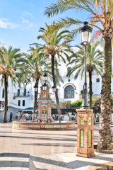 Fototapeta na wymiar The called 'Plaza de España', located in Vejer de la Frontera, a beautiful and very touristic white village in the province of Cadiz, southern Spain