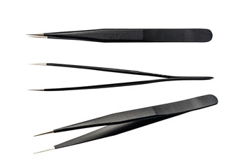 Metal tweezers isolated