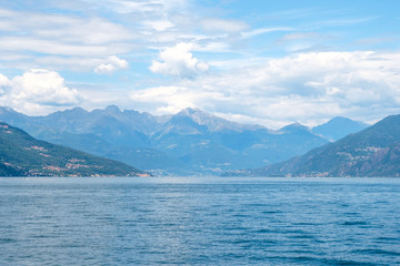 Lake Como with mountains and cloudy sky