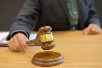 judge hold legal law gavel at courtroom. lawyer attorney justice at court