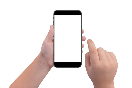 Little boy holding black modern smartphone with empty screen in hand, isolated on white background. Mockup