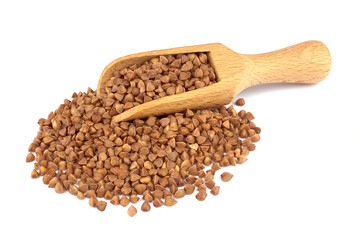 Buckwheat on wooden scoop isolated on white background