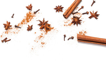 Cinnamon sticks and star anise isolated on white background