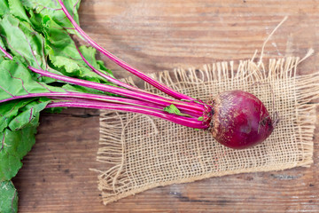 Organic beet on burlap.