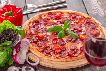 Homemade cheese pizza with salami