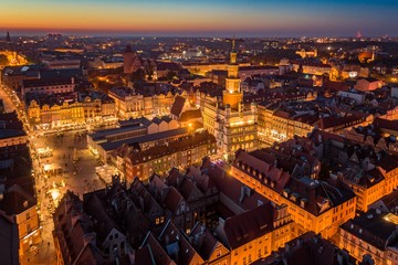 Evening aerial view on Poznan main square and old town.