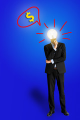 lamp bulb man  in black suit looking at copy-space thinking