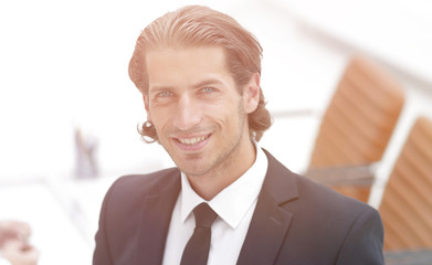 businessman standing in his office