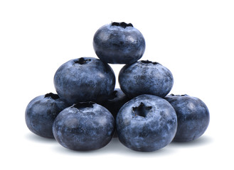 Blueberries with green leaves closeup, isolated on white background