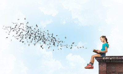 Concept of careless happy childhood with girl exploring this world