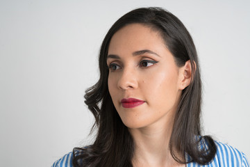 Woman portrait, face and looking left, with red lips