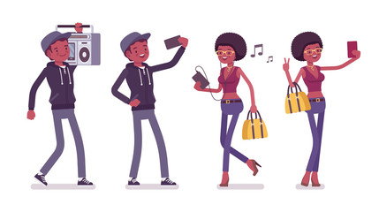 Young black man and woman with gadgets and boombox