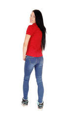 Obraz premium Beautiful woman standing in red blouse looking over shoulder
