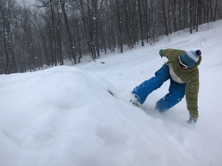 Fototapeta na wymiar Snowboarder in action.