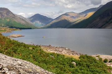Fototapeta na wymiar Stunning landscape view of Wast Water and fells in the Lake District National Park in the UK on a beautiful sunny day
