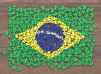 Fototapeta na wymiar Flag of the Brazil in disorganized pieces of a puzzle.