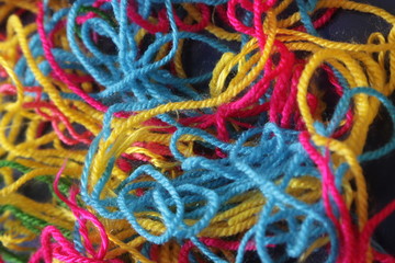 Tangled multicolored threads making a colorful pattern