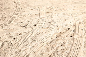 Traces of car tires on a dirt road
