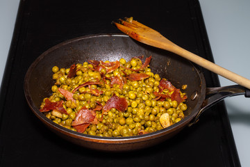 peanuts with spanish iberian ham and stick fork