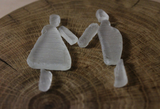 A couple (girl and boy) from white sea glass