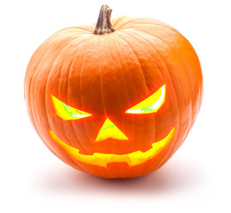 Halloween pumpkin grinning in the most evil fashion, isolated on white