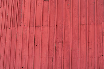 Red siding on an old barn makes an interesting background or texture pattern