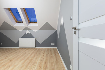 Kids bedroom with mountains chalkboard paint and new laminated floor