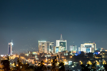Fototapeta premium A wide view of Kigali city skyline lit up at night