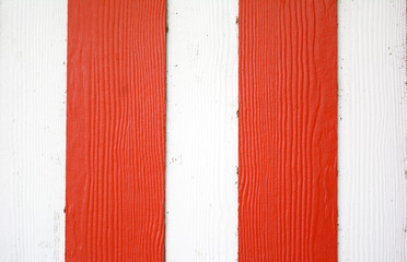the background of orange and white plywood  with old cement wall