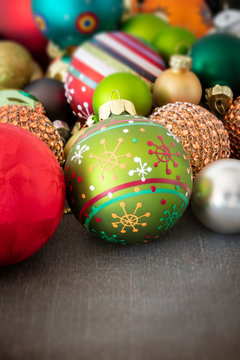 Christmas decoration glass balls on a wooden ground