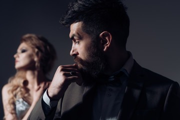 Love is a tender look. Bearded man and sexy woman on first date. Happy valentines day. Couple of man and woman date on valentines day. Couple in love. I love first dates