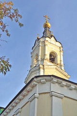 Obraz premium belfry of the old church in October