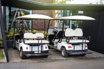 Golf cars parking at the hotel for clients service