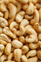 Cashew with no shell on a background. Macro nuts, Organic vegan food.