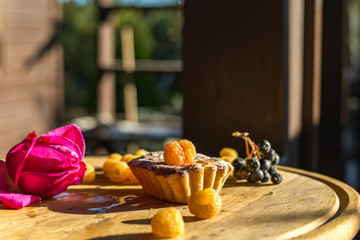 cottage cheese cake with raspberries on a wooden tray