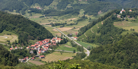 Fototapeta na wymiar Aerial view of old village Podsreda with pilgrimage site Stara Sveta gora in south Styria (Stajerska), Slovenia