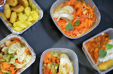 Healthy food and diet concept, restaurant dish delivery. Take away of fitness meal. Weight loss nutrition in foil boxes.