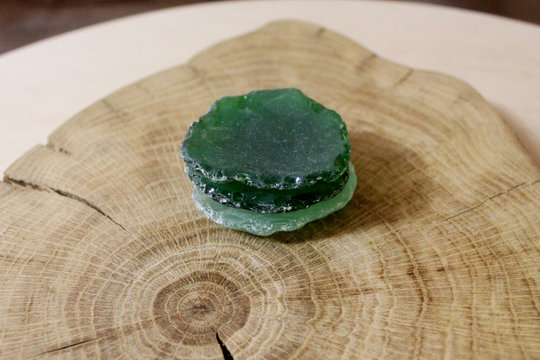 White and green sea glass bottoms