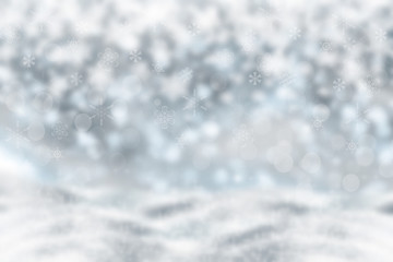 Abstract blurred festive winter christmas or Happy New Year background with shiny blue and white bokeh lighted snow landscape. Space for your design. Card concept.