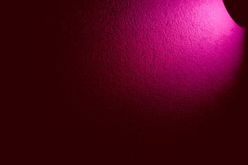 Pink light on a dark background