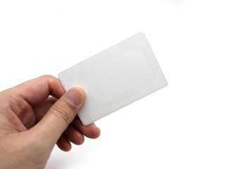 Hand holding an empty white card isolated on white background.