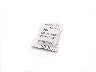 Silica gel packets isolated on a white background.