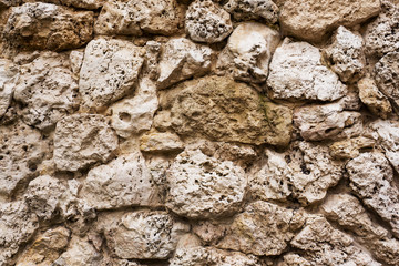 Texture of old gray stone Background the ruins of the building